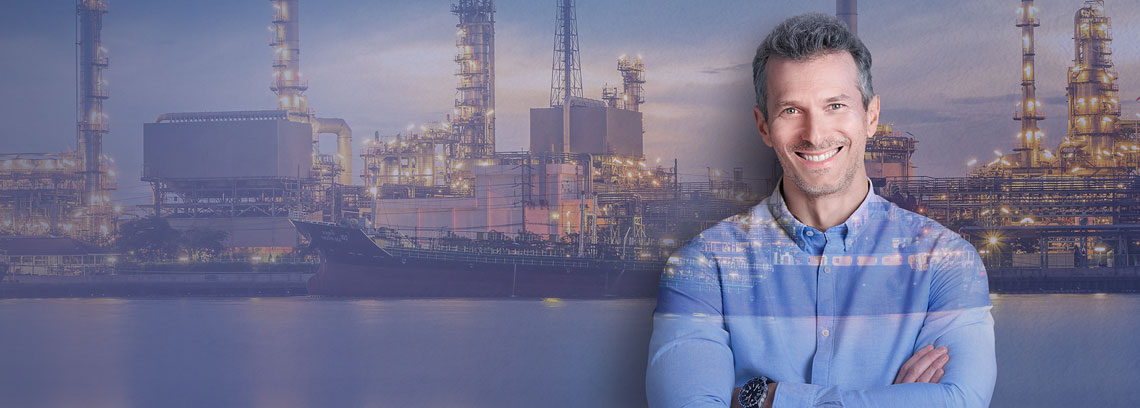 Ex Automatisierung Person vor Industrie Hintergrund